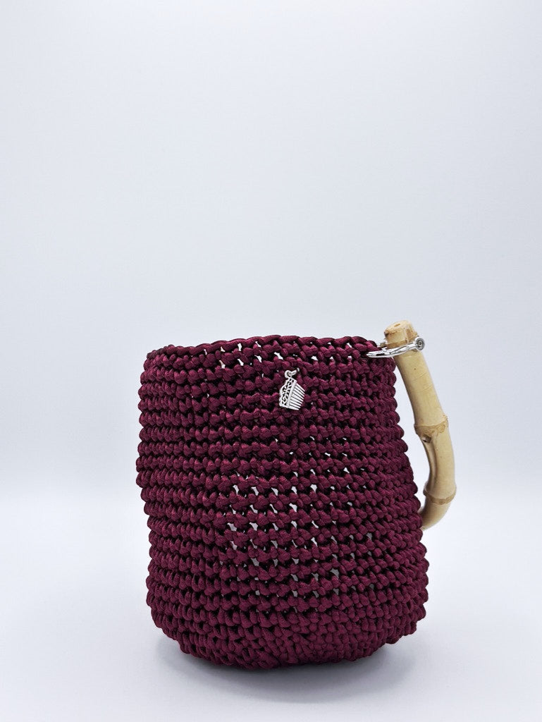 Bolsos de seda con asas de bambú